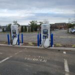 EVgo DC fast charging stall in a shopping center parking lot