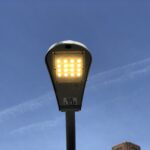 Modern LED streetlight on a New York City pedestrian overpass