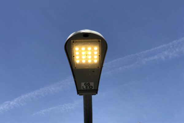 Modern LED streetlight on a New York City pedestrian overpass
