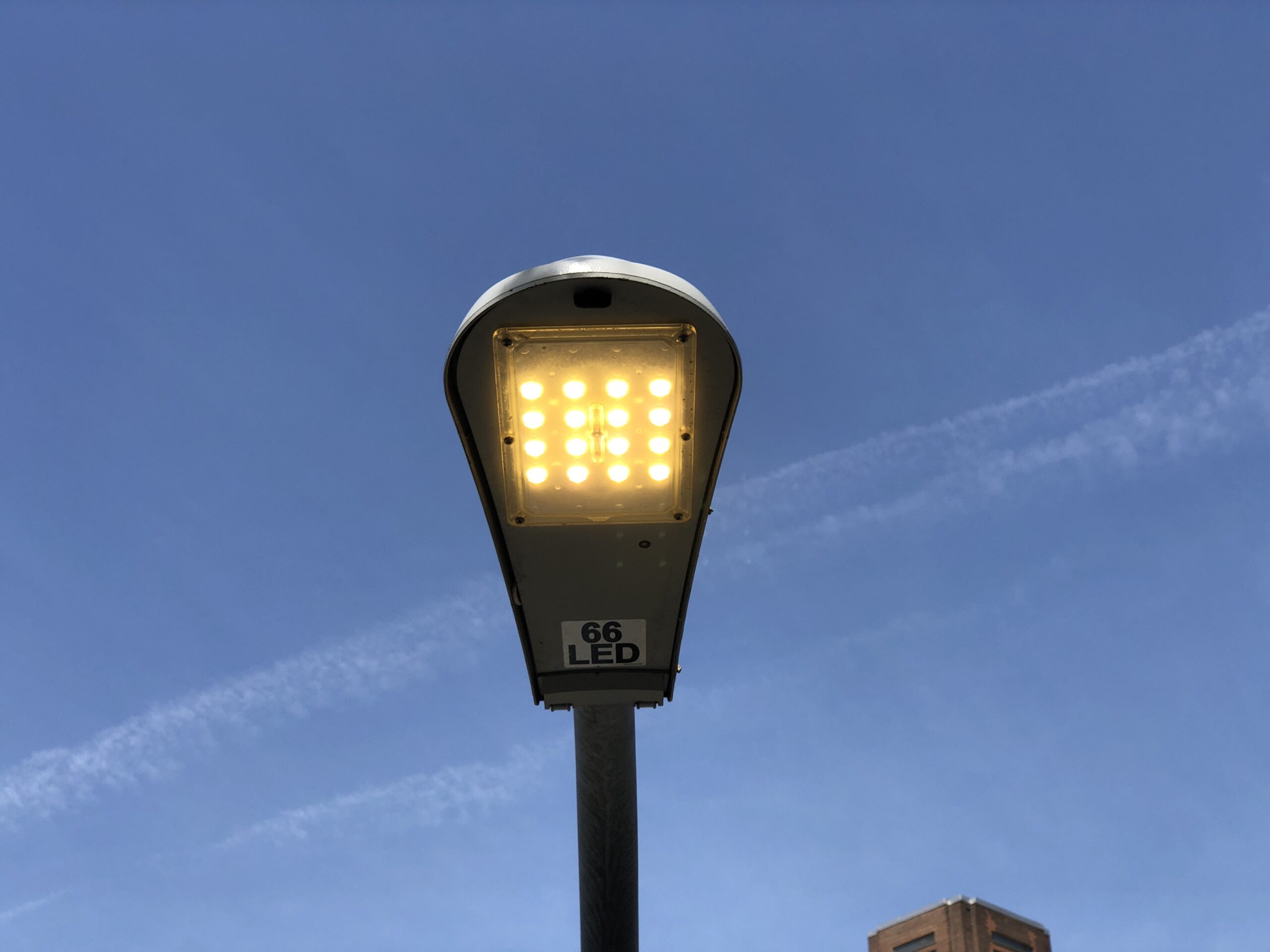 Modern LED streetlight on a New York City pedestrian overpass